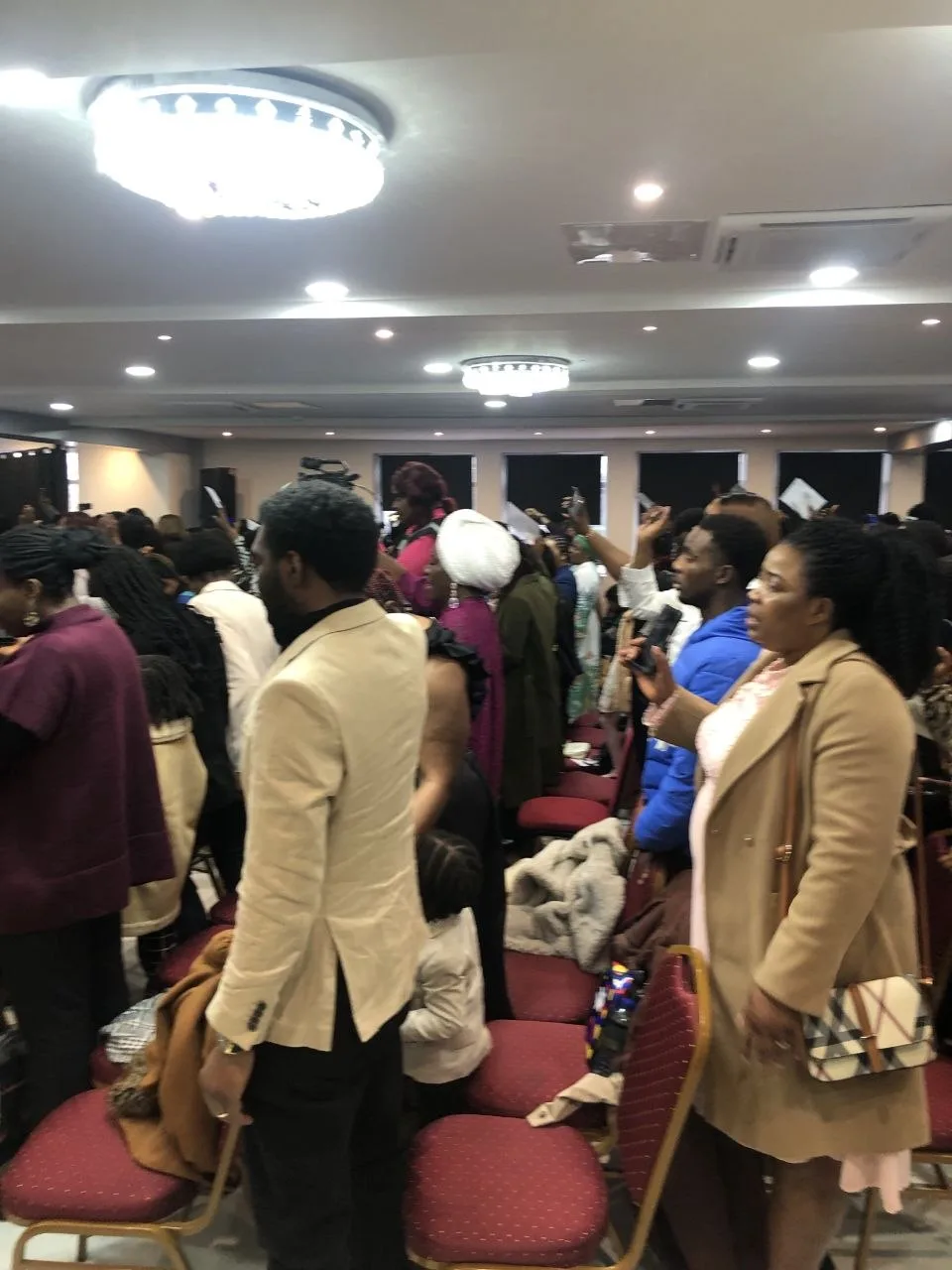 Congregation standing in worship during a church service at P2 Centre, Erith
