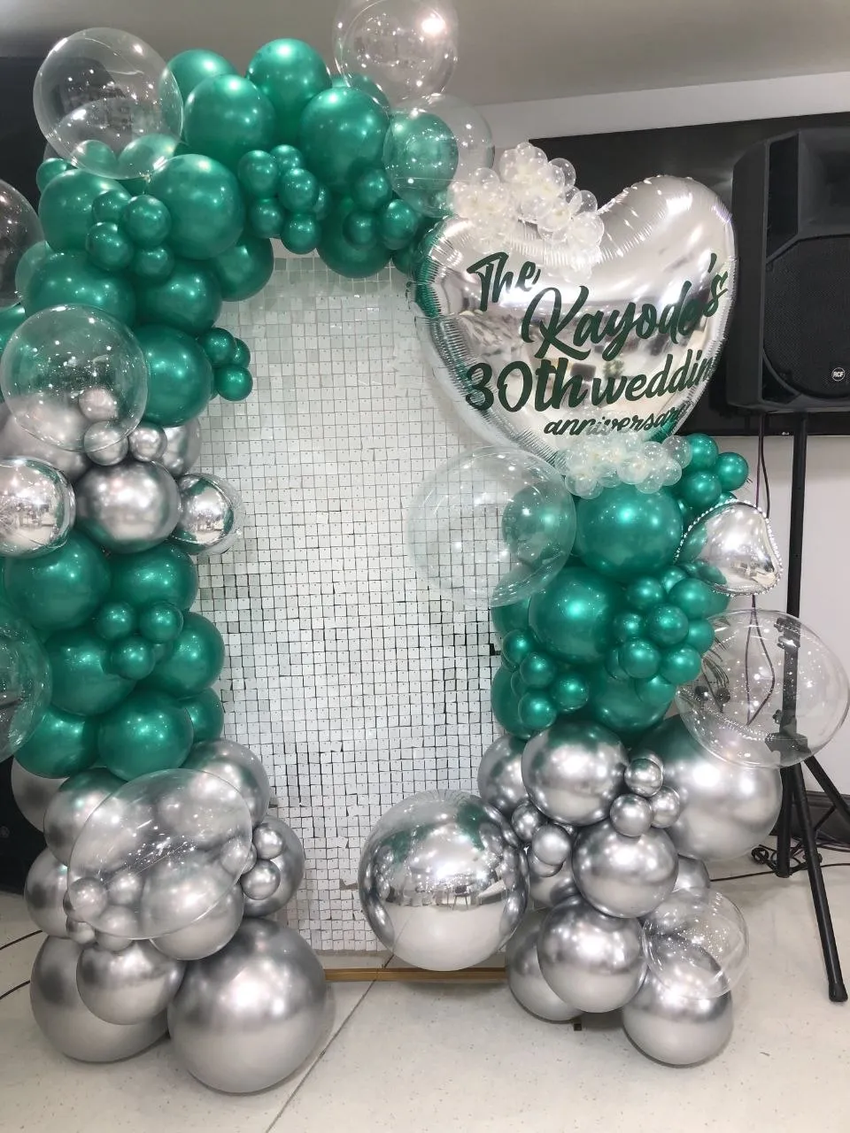 Silver and emerald balloon backdrop for a 30th wedding anniversary at P2 Centre, Erith
