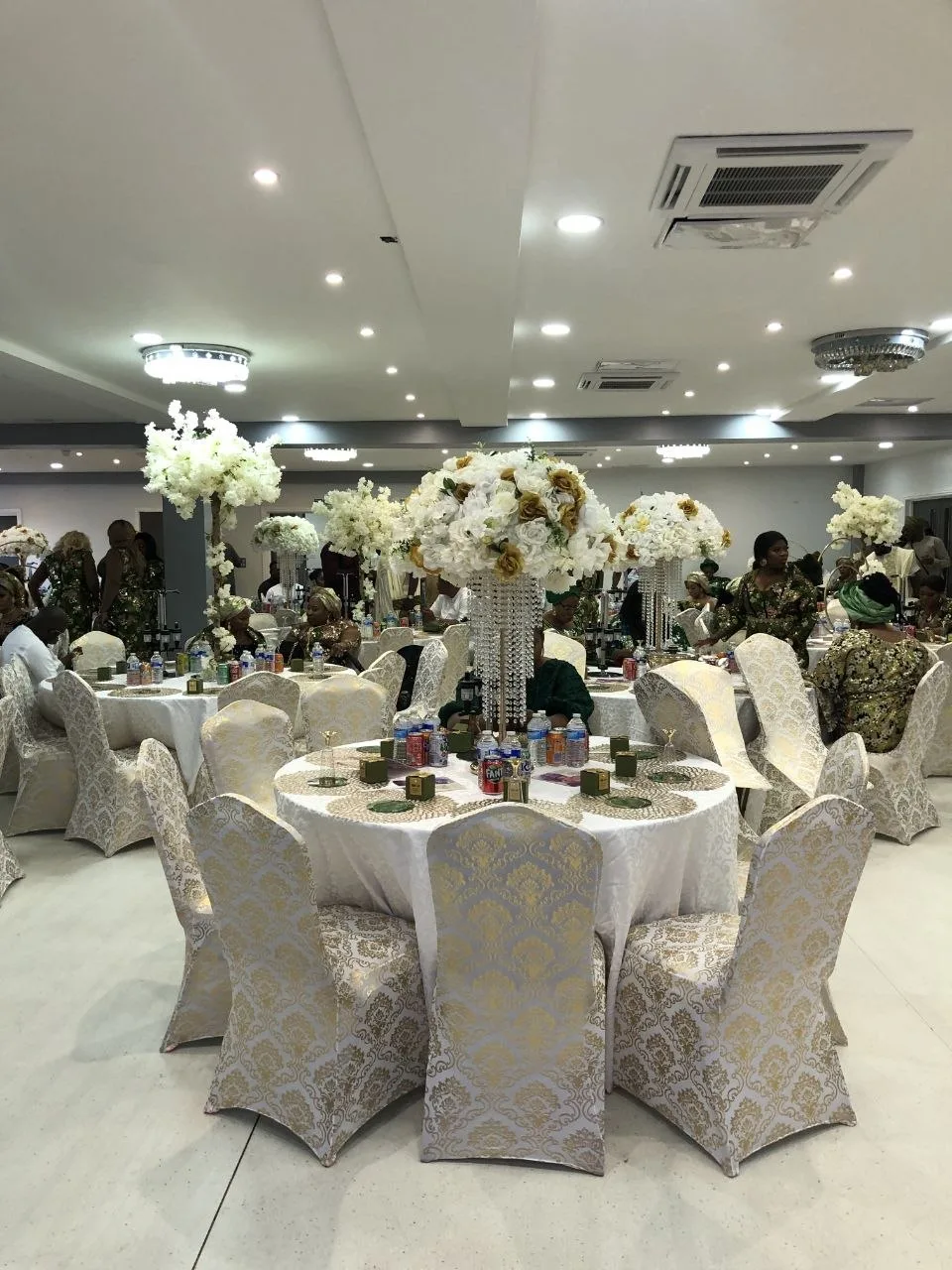 Guests seated at a dressed celebration in the P2 Centre event hall in Erith